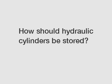 How should hydraulic cylinders be stored?