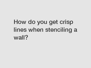 How do you get crisp lines when stenciling a wall?