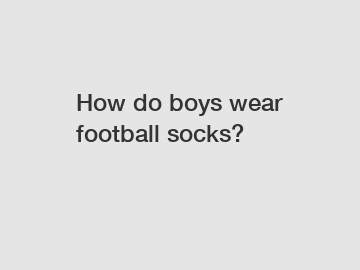 How do boys wear football socks?