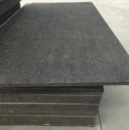 What are the benefits of using bitumen impregnated fibreboard in construction?