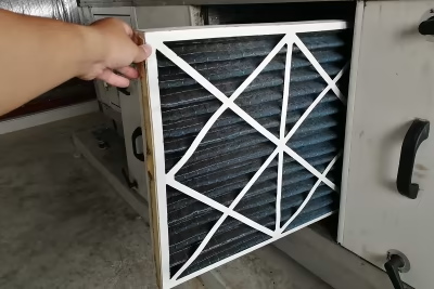 How do I change the filter in my AC blower?