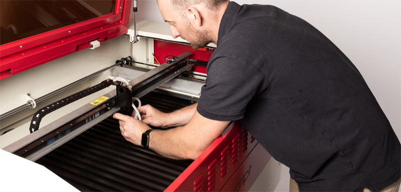 How often should a laser cutter be cleaned?