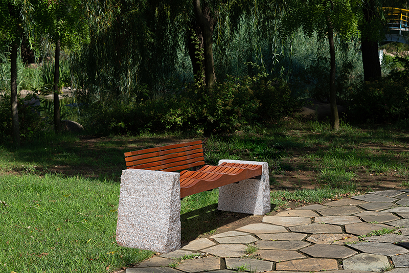 The Versatility of Stone Benches with Backrests